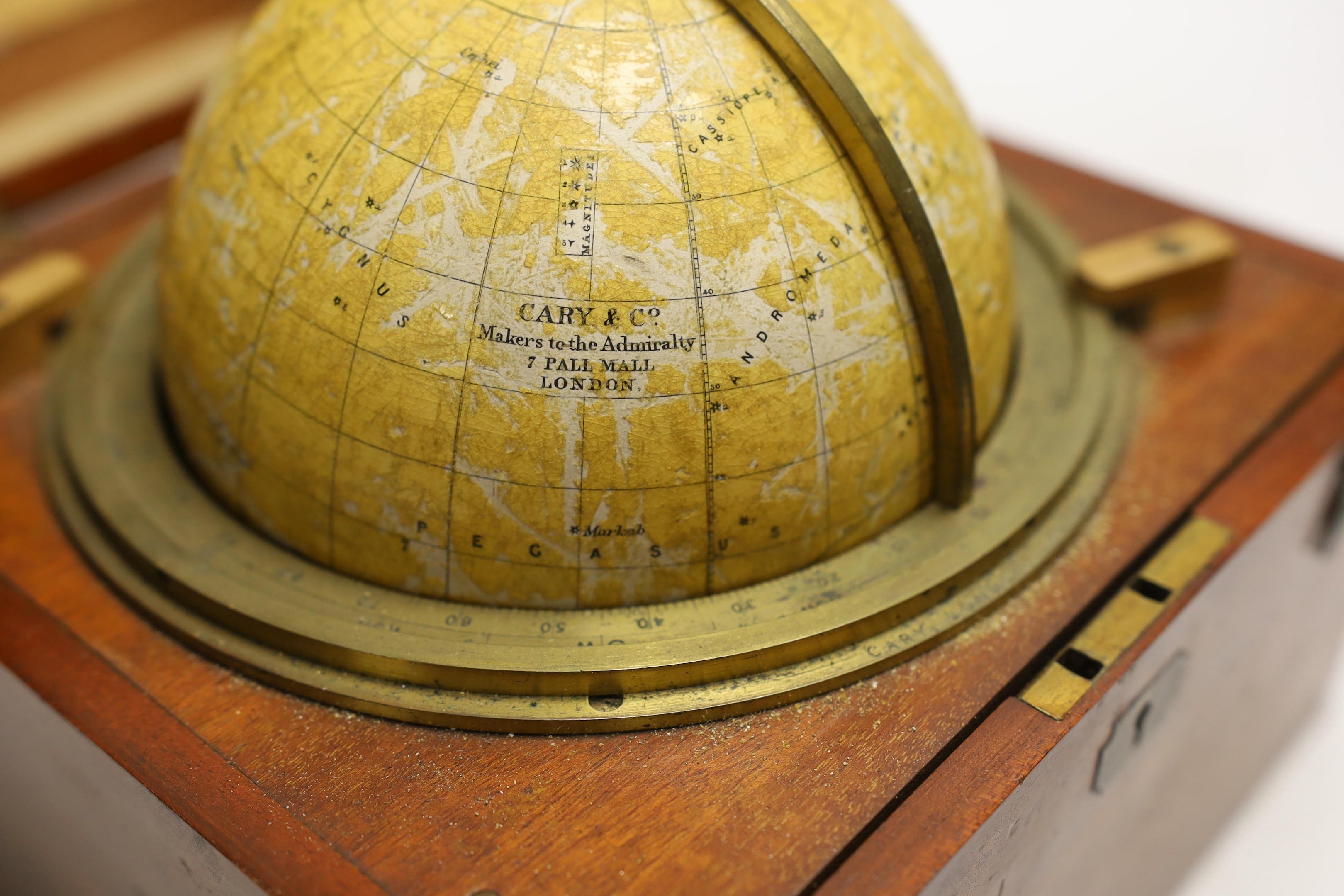 A late 19th century cased astronomical globe by Cary & Co. In mahogany case, globe 14cm